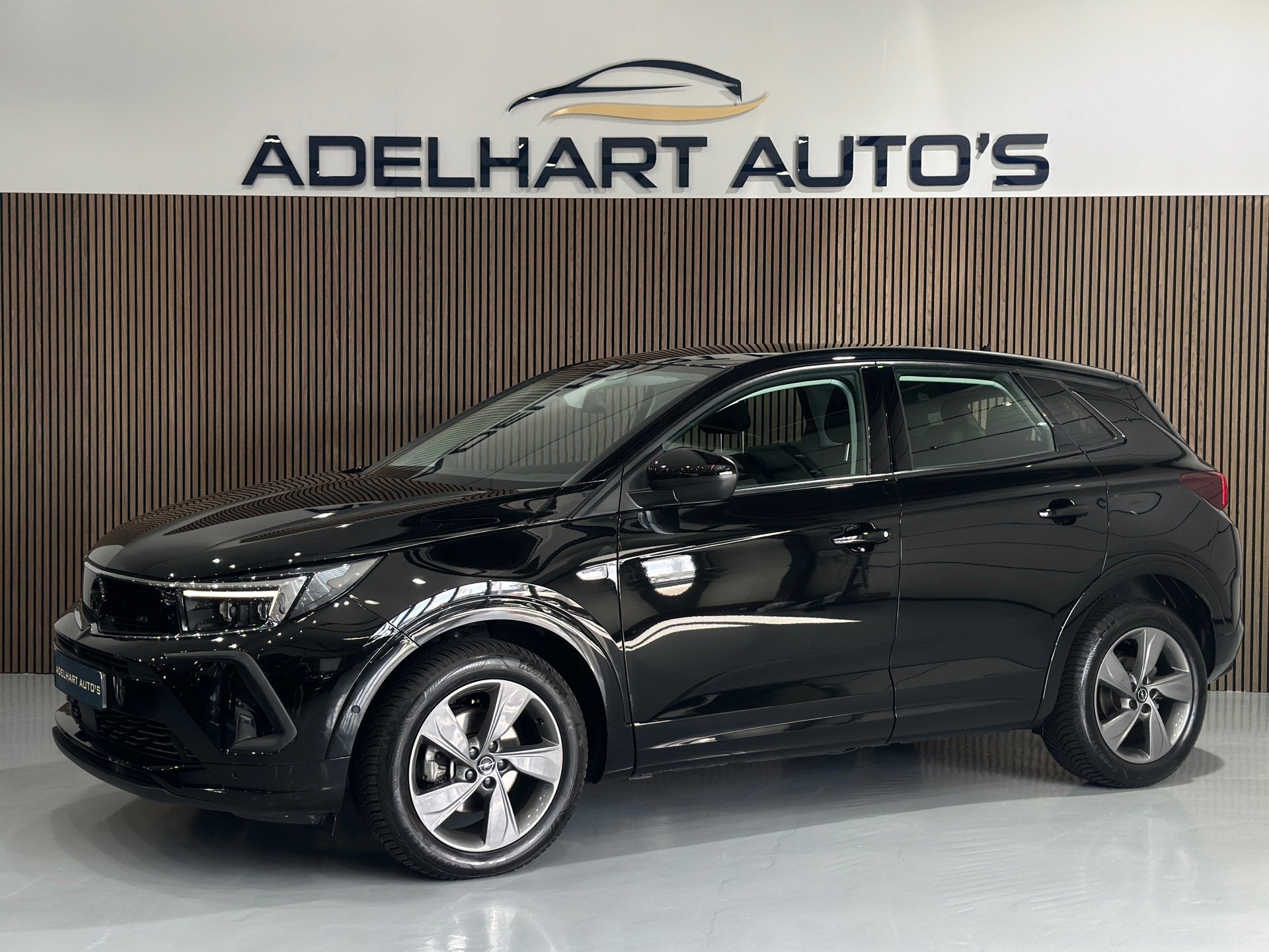 Opel Grandland 1.2 Turbo Automaat Business Elégance / Navig, Auto's, Gebruikt, Zwart, 1199 cc, Automatische klimaatregeling