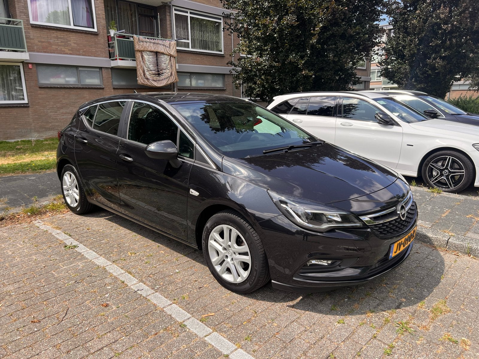 Opel Astra 1.0 Turbo 77KW 5D 2016 Zwart, Auto's, 610 kg, Origineel Nederlands, Handgeschakeld, Particulier