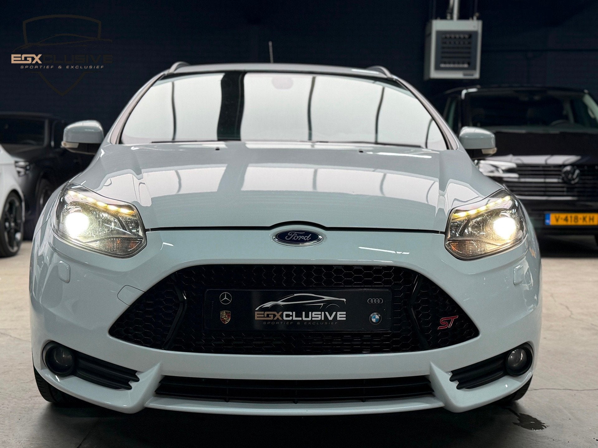 Ford Focus Wagon 2.0 EcoBoost ST-3 CAMERA|STOELVERWARMING|LE, Auto's, Gebruikt, 4 cilinders, Automatische klimaatregeling, Wit