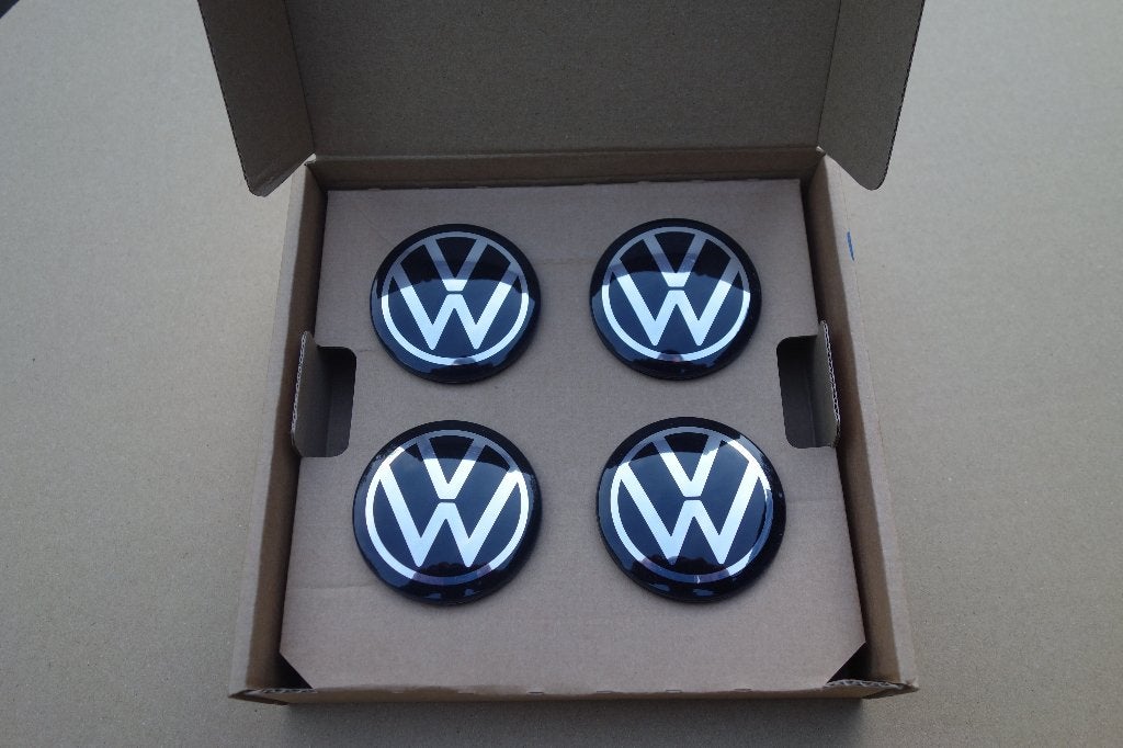 VW Dynamische naafdoppen Nieuw en Originele set, Ophalen of Verzenden, Nieuw, Volkswagen