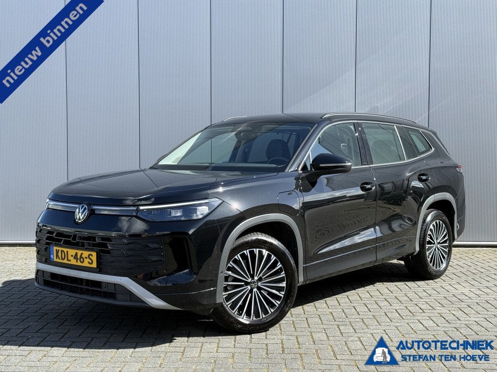 Volkswagen Tayron 1.5 eHybrid Life Trekhaak Camera Carplay F, Auto's, Volkswagen, Stof, 4 cilinders, 150 pk, Zwart