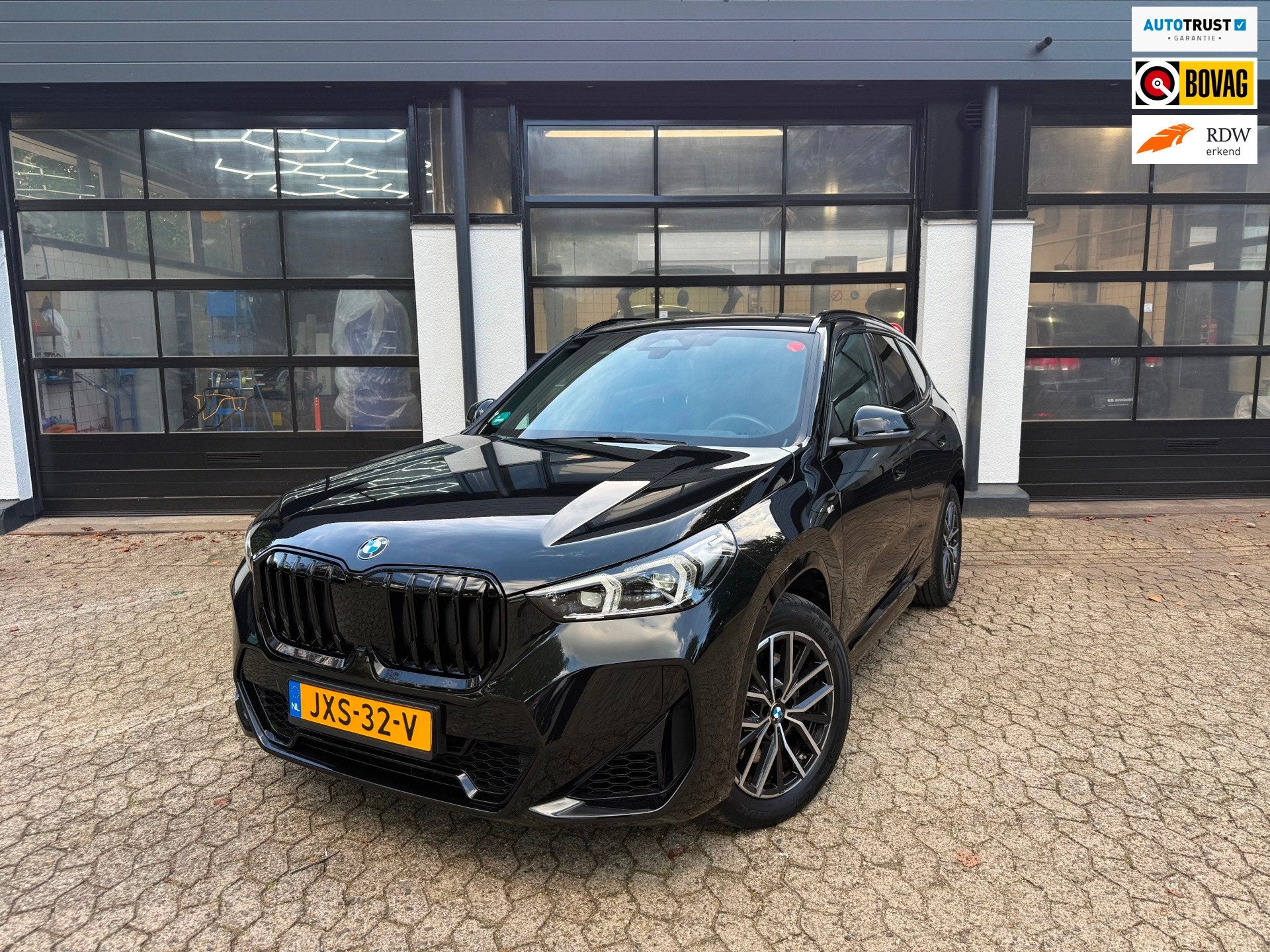 BMW X1 XDrive23i *M-Pakket*Pano*Pdc*Vol opties*, Auto's, 4 cilinders, Zwart, Leder, Bedrijf