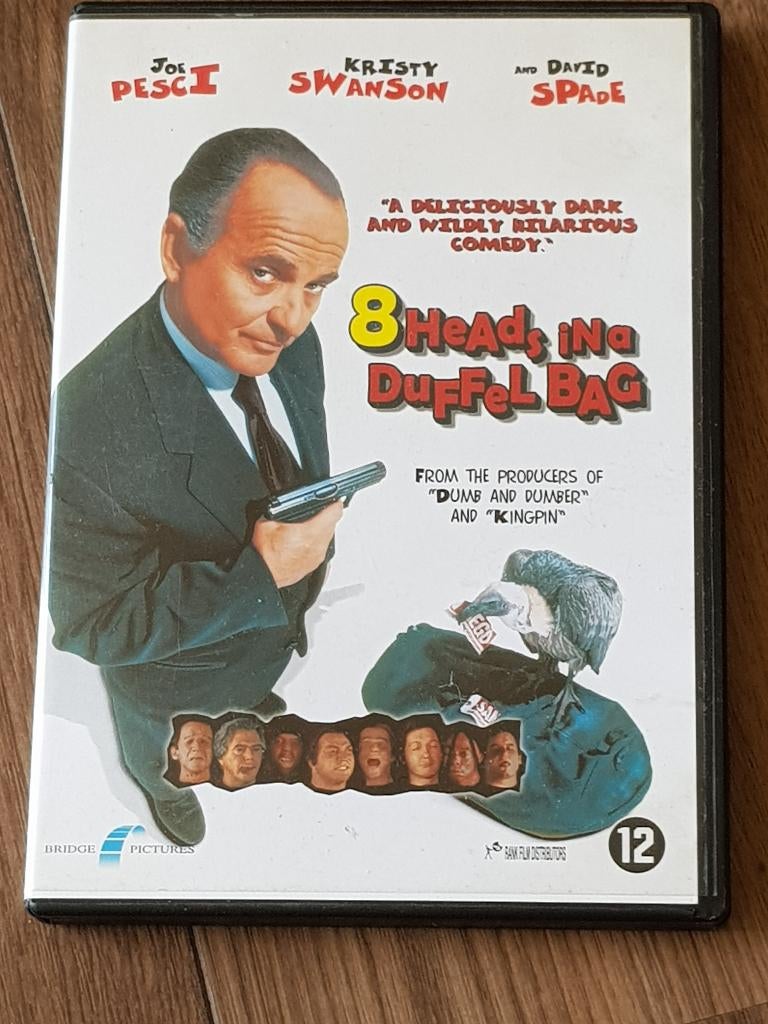8 heads, in a duffelbag, Alle leeftijden, Ophalen of Verzenden, Zo goed als nieuw, Romantische komedie