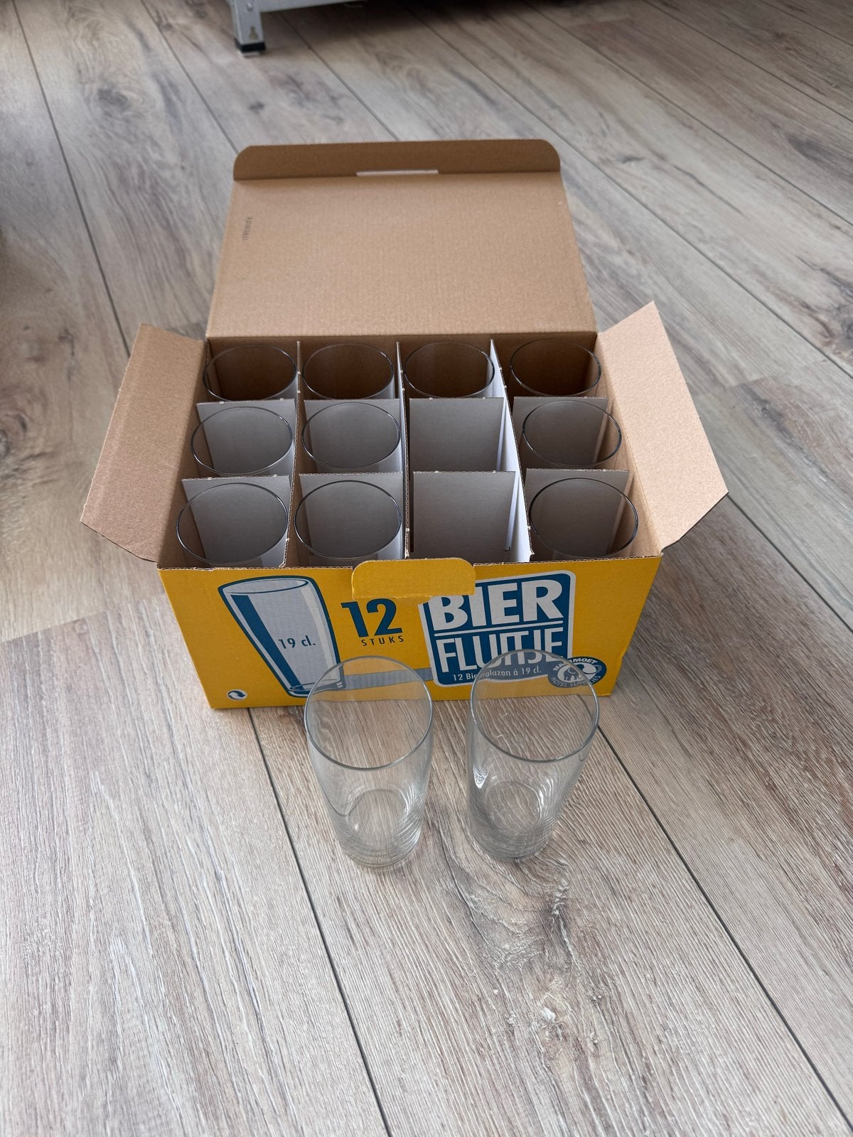 12 ongebruikte bierglazen (fluitjes) - 19 cl, Ophalen of Verzenden, Nieuw, Glas