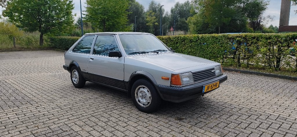 UNIEK 1982 Mazda 323 2e eigenaar, Auto's, Voorwielaandrijving, Stof, 4 cilinders, 68 pk