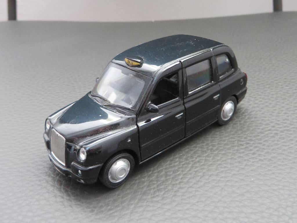 Welly London Taxi TX 4, Ophalen of Verzenden, Zo goed als nieuw, Auto