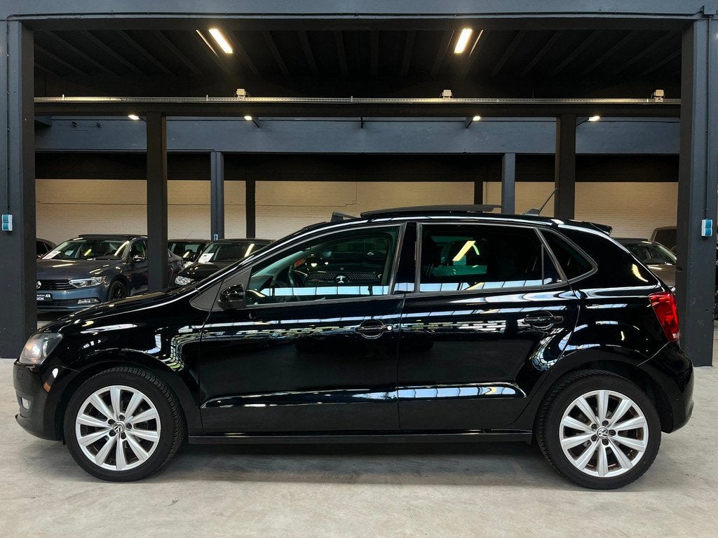 Volkswagen Polo 1.2 TSI Highline Automaat/Pano/Navi/, Auto's, Volkswagen, Gebruikt, Zwart, 4 cilinders, Leder en Stof
