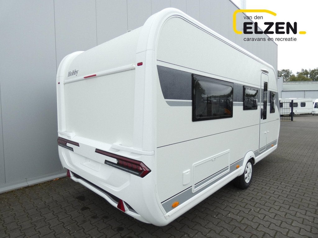Hobby De Luxe 460 LU Actieprijs, incl. opties, Caravans en Kamperen, Rondzit, Hobby, Bedrijf, 5 tot 6 meter