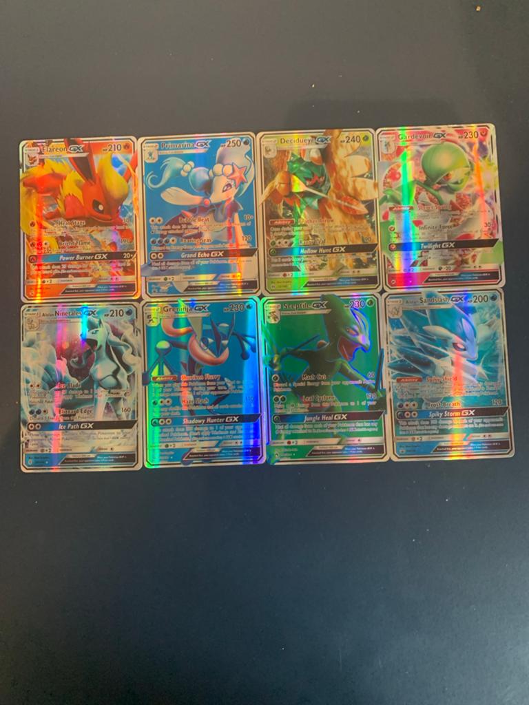 8 Pokémon GX kaarten - Flareon, Primarina, Decidueye, Gardev, Ophalen of Verzenden