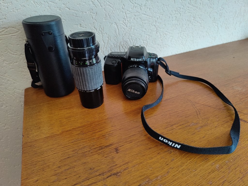 Nikon F50 fototoestel met Sigma 210mm lens made in japan., Ophalen of Verzenden, Gebruikt, Compact, Nikon