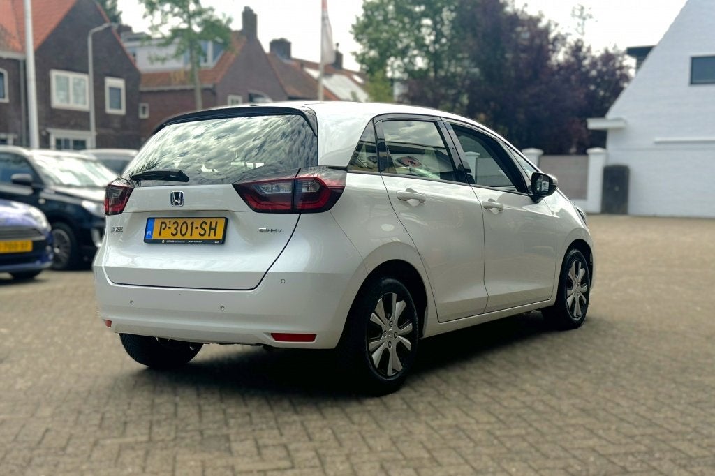 Honda Jazz 1.5 e:HEV Elegance (bj 2022, automaat), 12 maanden, 28 km/l, Euro 6, Leder en Stof