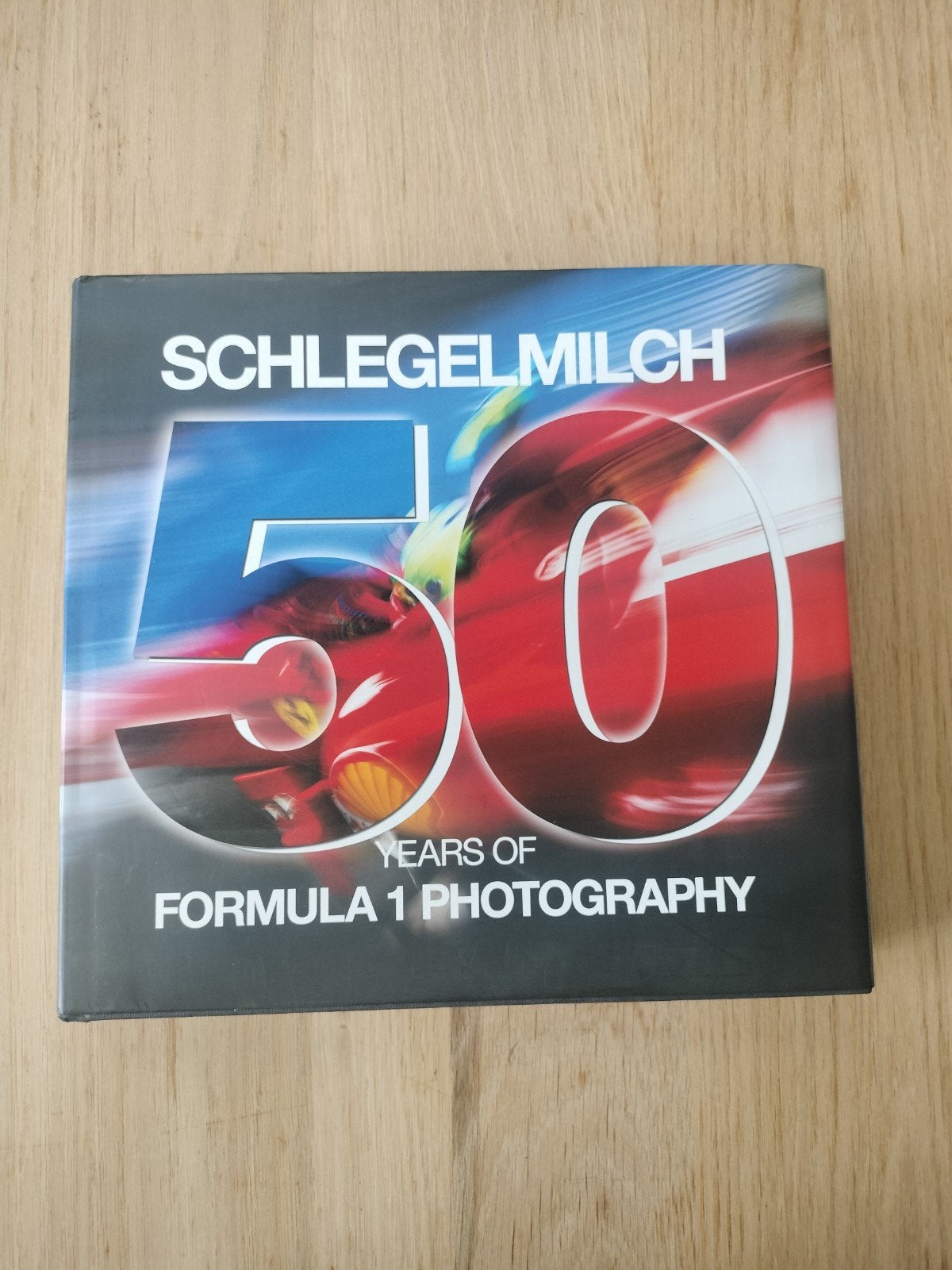 Schlegelmilch 50 jaar formule 1 in beeld, Boeken, Ophalen of Verzenden, Zo goed als nieuw, Overige sporten