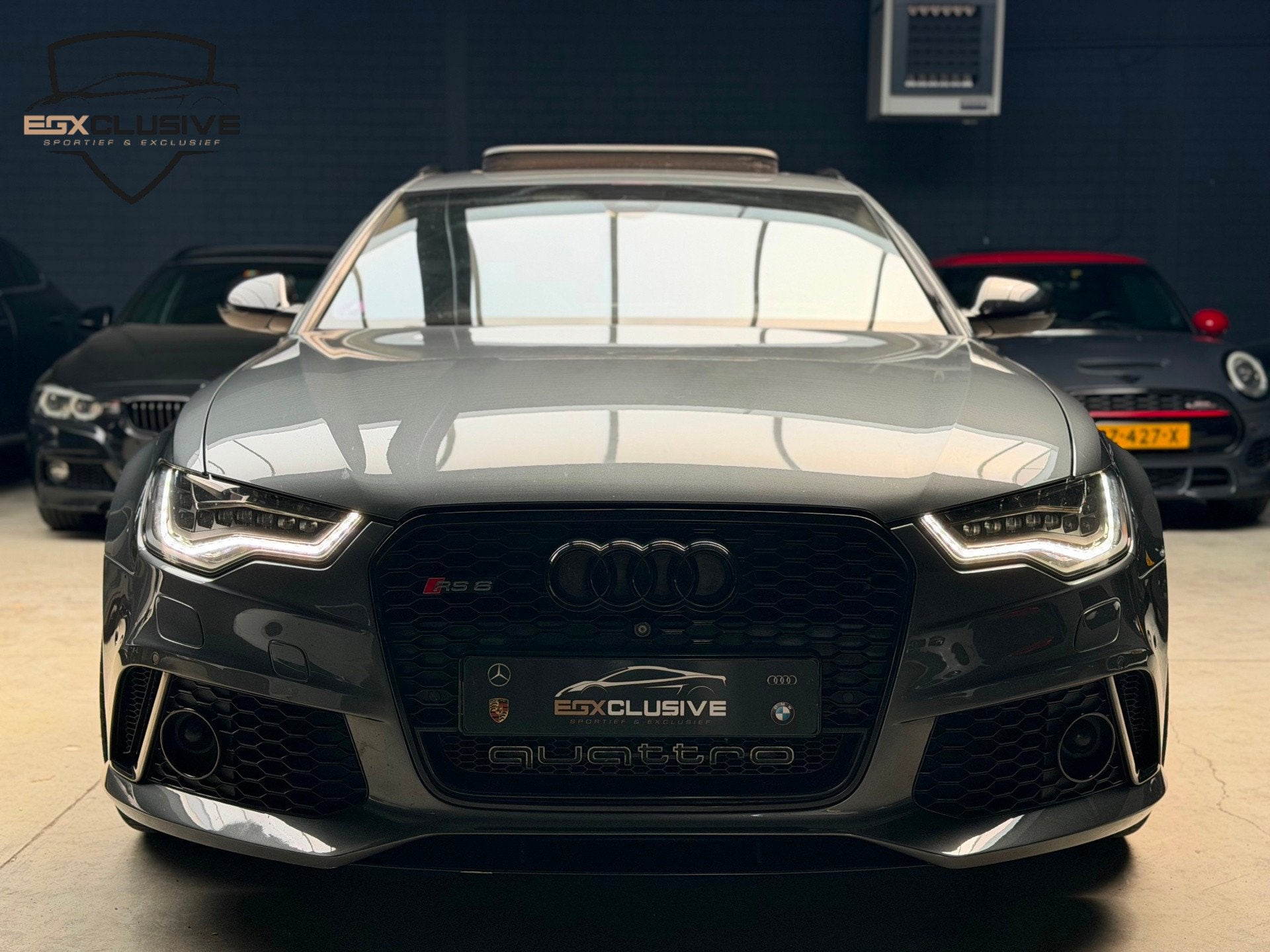 Audi RS6 Quattro Pro Line Plus PANO/CARBON/MILLTEK/360CAMERA, Auto's, Automaat, Euro 5, Gebruikt, Leder en Stof