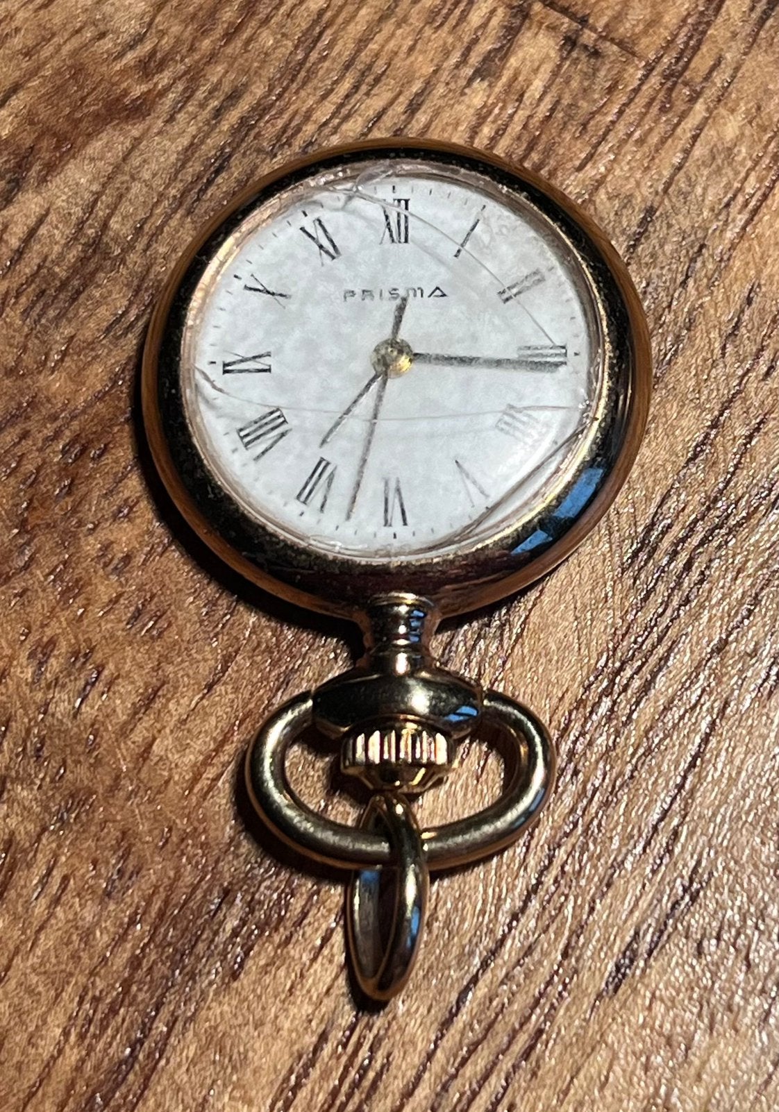Prisma goudkleurig zakhorloge in goede staat loopt, Sieraden, Tassen en Uiterlijk, Ophalen of Verzenden, Staal, Overige merken