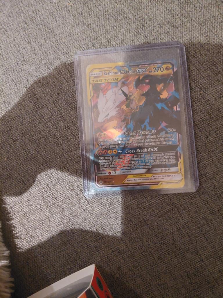 Pokémon Kaart: Reshiram & Zekrom GX TAG TEAM (Full Art), Ophalen of Verzenden, Zo goed als nieuw, Losse kaart, Foil