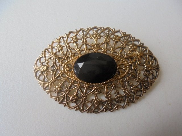Prachtige broche goudkleur steen, Overige materialen, 4 tot 7 cm, Ophalen of Verzenden, Zo goed als nieuw