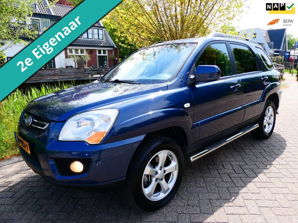 Kia Sportage 2.0 CVVT Fifteen 2e eig. Clima Cruise Kanteldak, 1442 kg, Gebruikt, 4 cilinders, Blauw