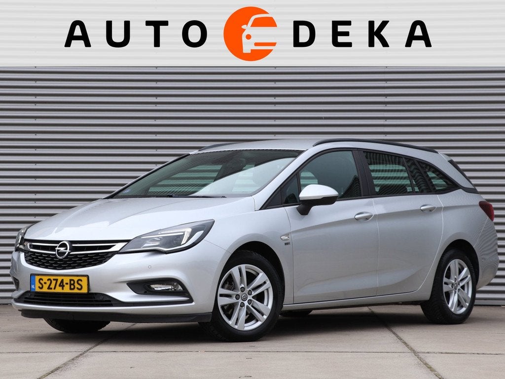 Opel Astra Sports Tourer 1.4 Turbo 120 Jaar Edition Automaat, Auto's, Stof, Gebruikt, 150 pk, 1399 cc