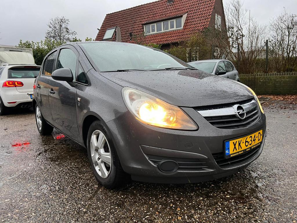 Opel Corsa 1.2 Twinport 85pk 5d 2010 Grijs, Auto's, Voorwielaandrijving, 4 cilinders, 1229 cc, 49 €/maand