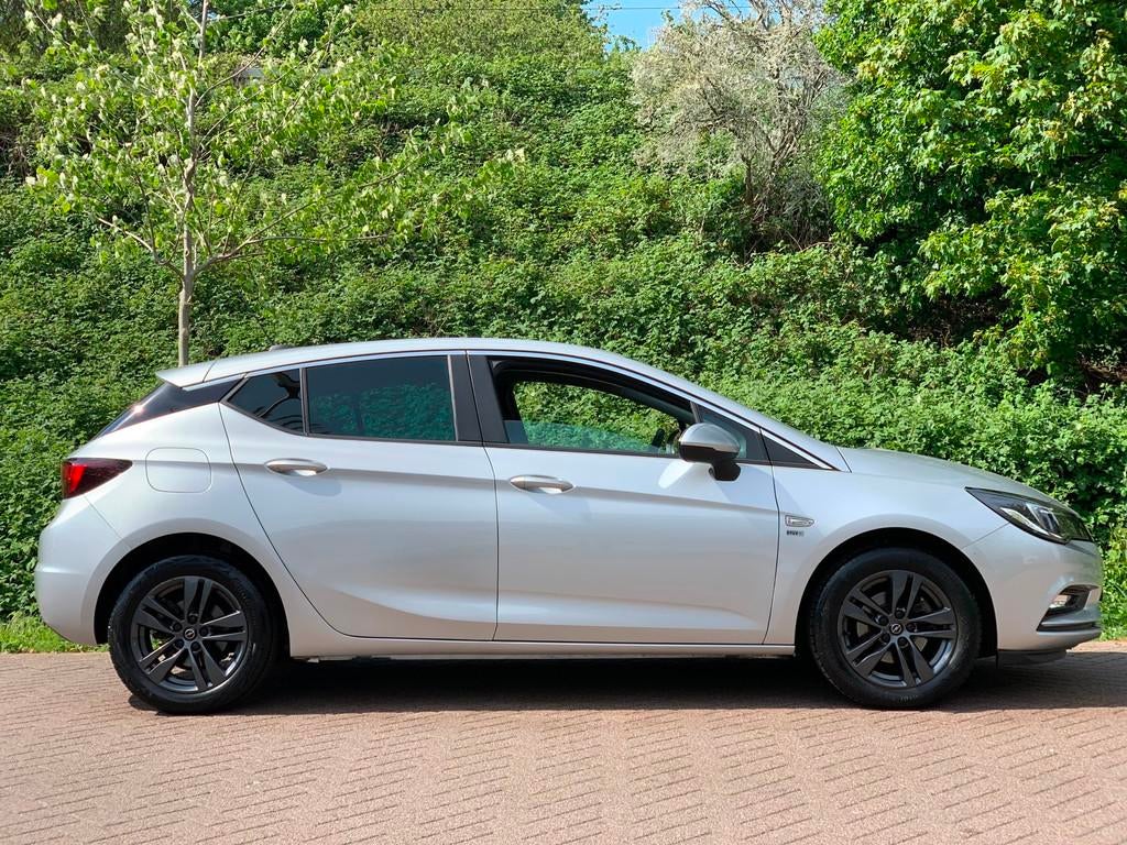Opel Astra 1.0 Turbo 120 Jaar Edition 23DKM NIEUWSTAAT !, Gebruikt, Euro 6, 610 kg, Origineel Nederlands