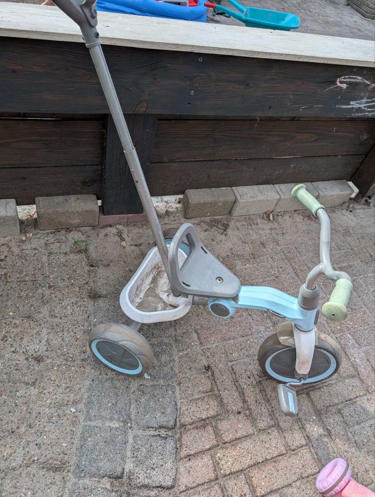 driewieler met duwstang, Ophalen, Gebruikt, Duwstang