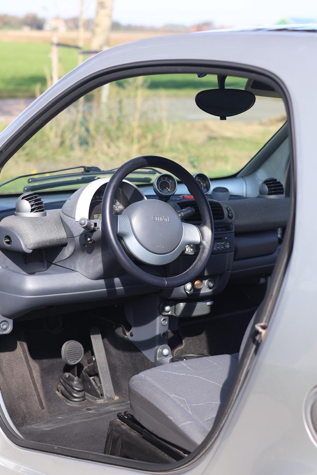 Smart 0.7 City Coupe 45KW 2006 Grijs, Auto's, Smart, 18 €/maand, 61 pk, Origineel Nederlands, Grijs