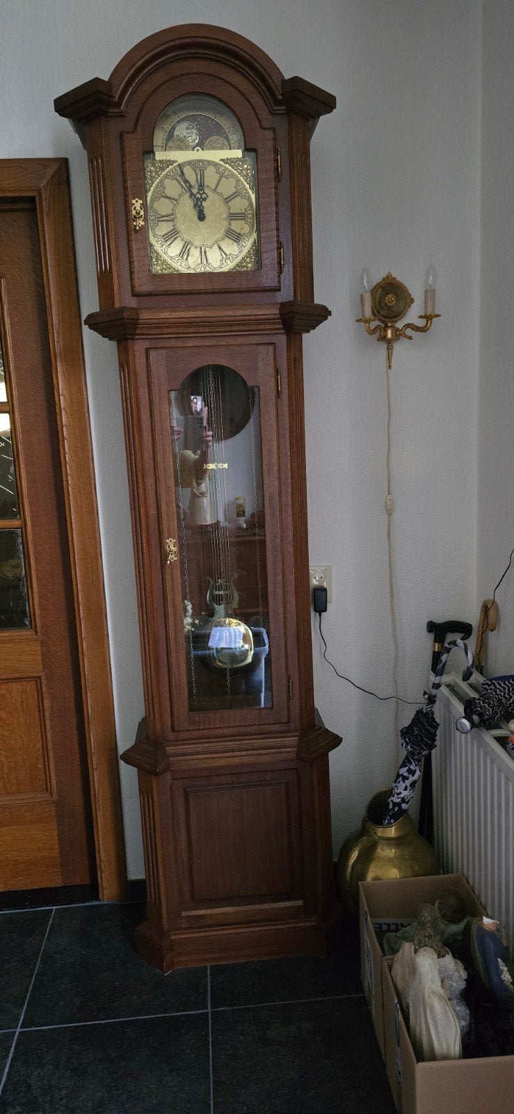 Staande klok met maanfase en slinger, Ophalen