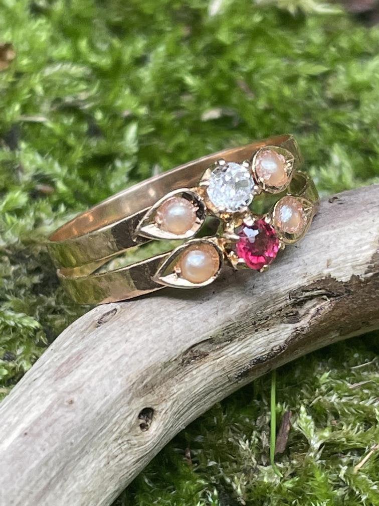 18 k ring met robijn saffier en zaadpareltjes