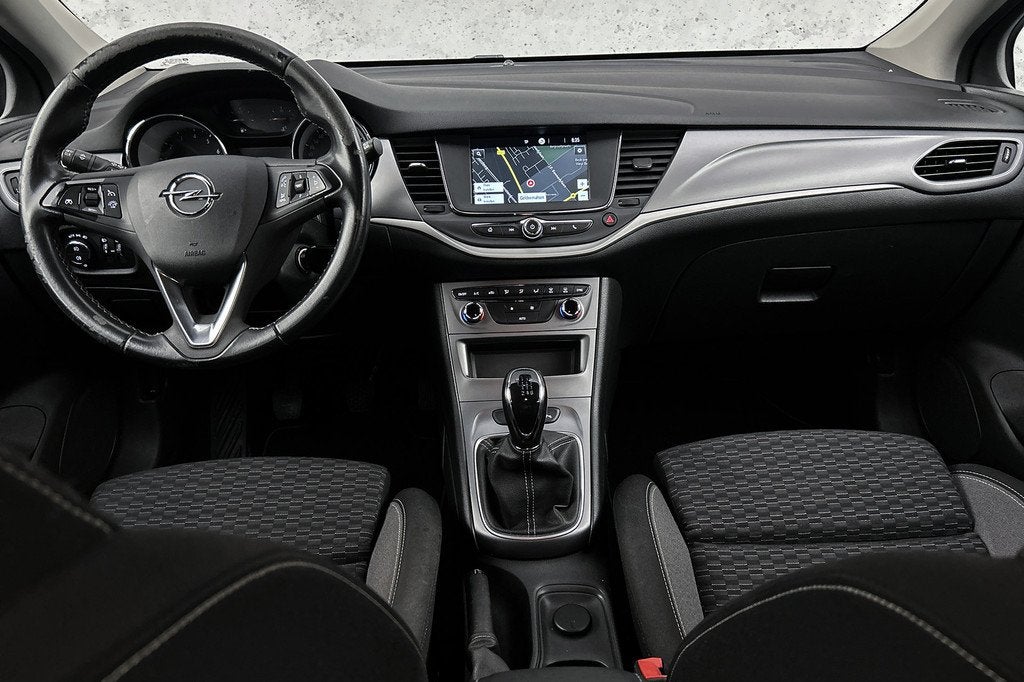 Opel Astra Sports Tourer 1.2 Business Edition | Camera | Nav, Auto's, Voorwielaandrijving, Stof, Gebruikt, Euro 6