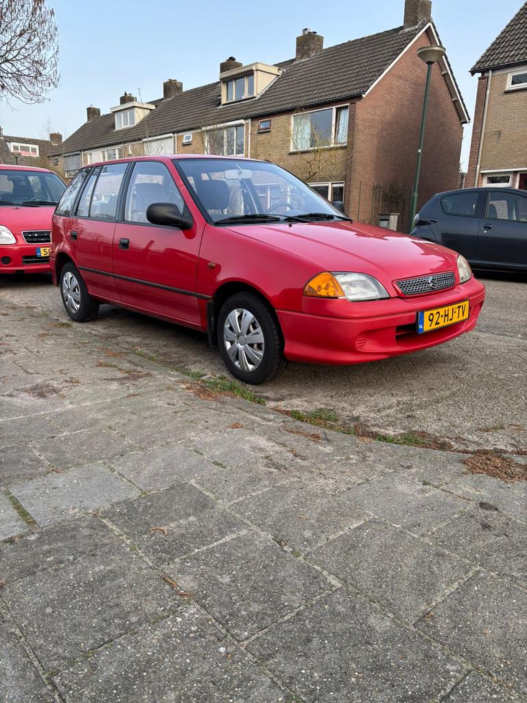 Suzuki Swift 1.3 5DRS AUT 2002 Rood, Auto's, Stof, 4 cilinders, Swift, Airconditioning