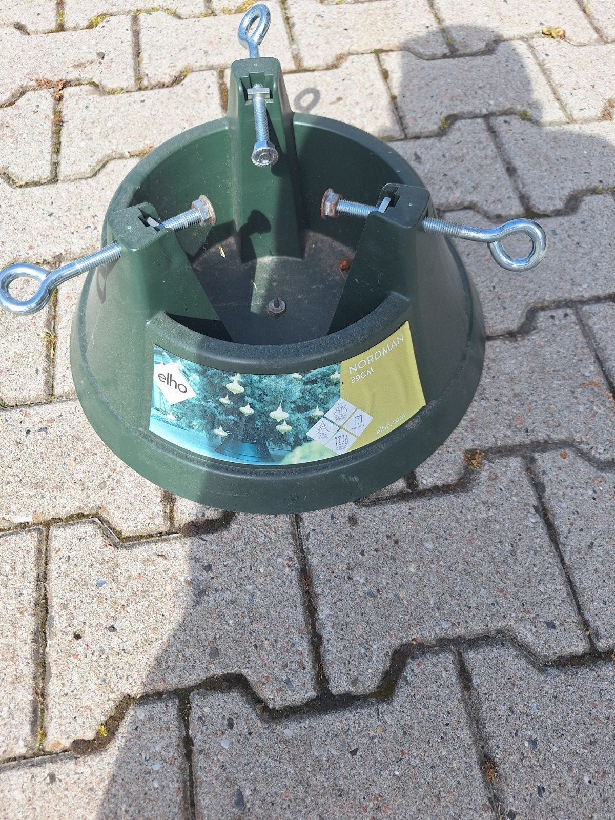 Kerstboomstandaard, Ophalen