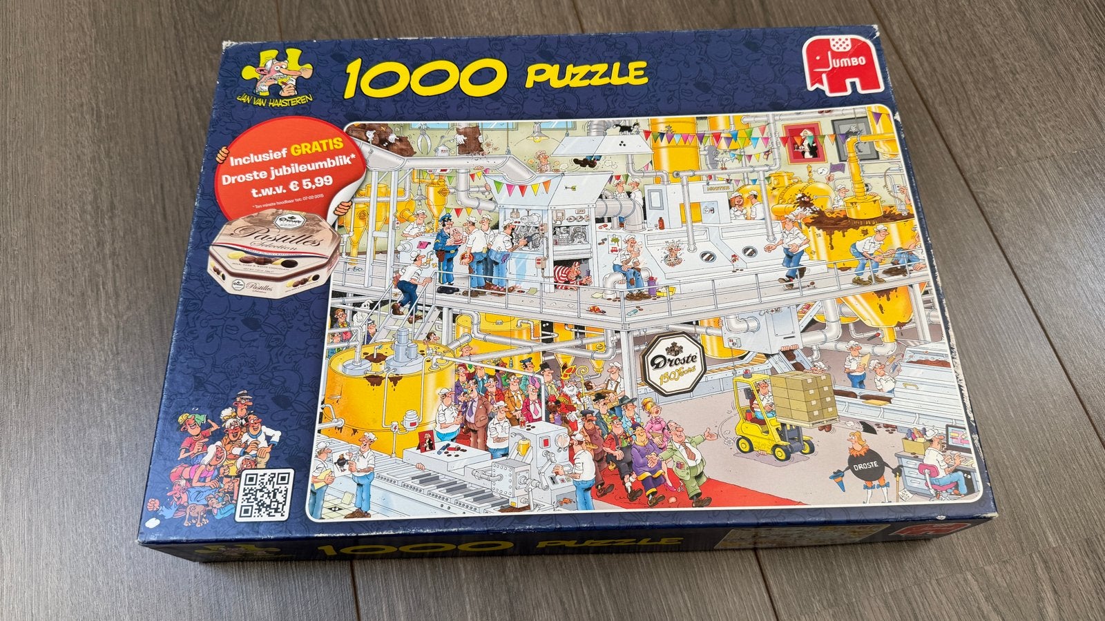 Jan van Haasteren puzzel Droste De chocolade fabriek, Ophalen of Verzenden, 500 t/m 1500 stukjes, Gebruikt, Legpuzzel