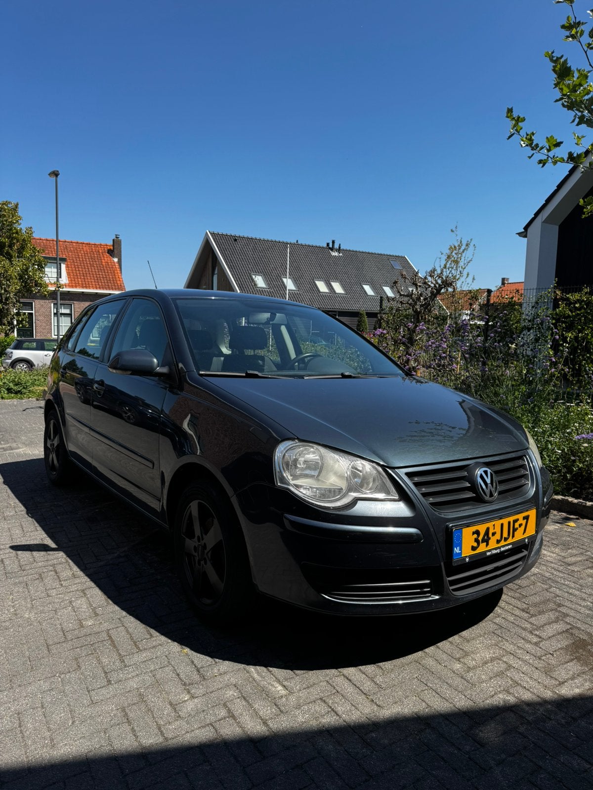 Volkswagen Polo 1.2 51KW 2009 Blauw, Voorwielaandrijving, Stof, 40 €/maand, Zwart