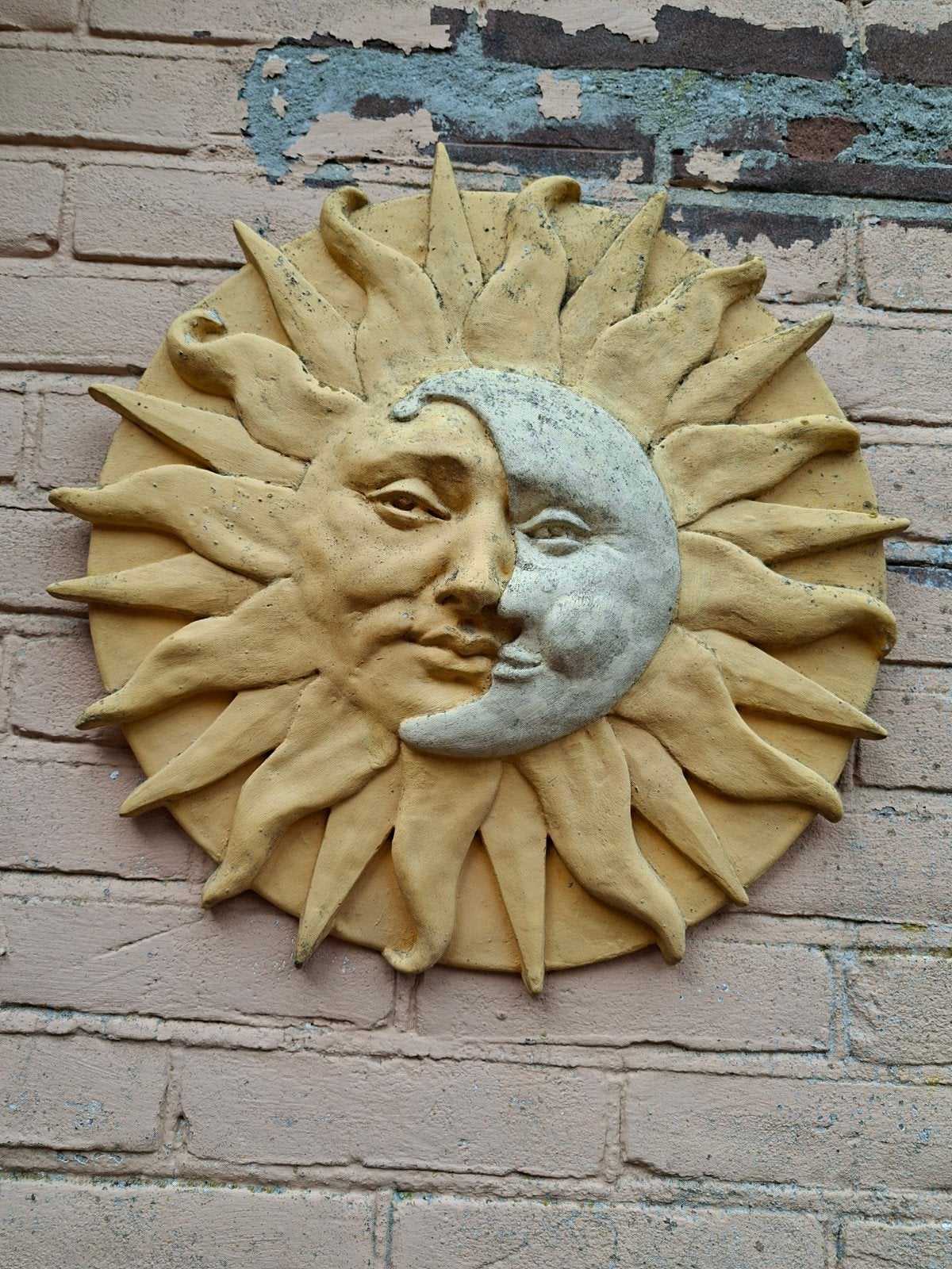 wandornament zon en maan, Ophalen