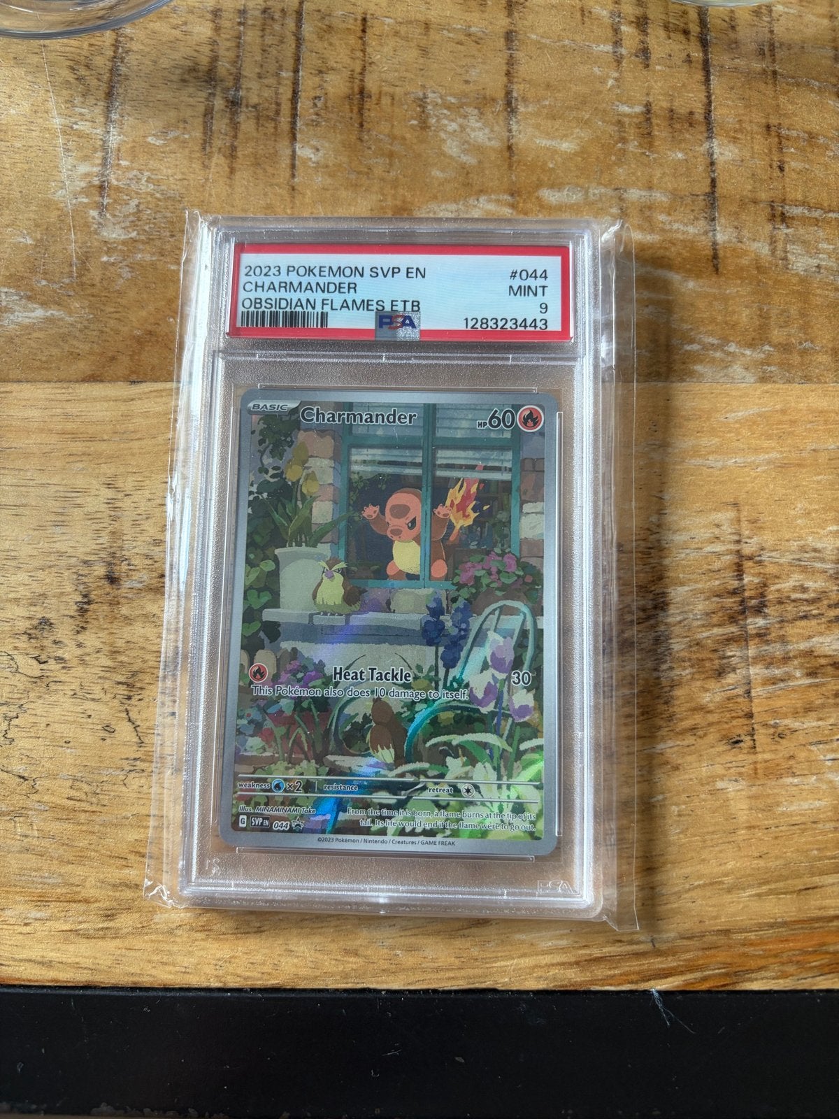 Charmander 044 Promo 2023 PSA 9 - Obsidian Flames ETB, Ophalen of Verzenden, Zo goed als nieuw, Losse kaart