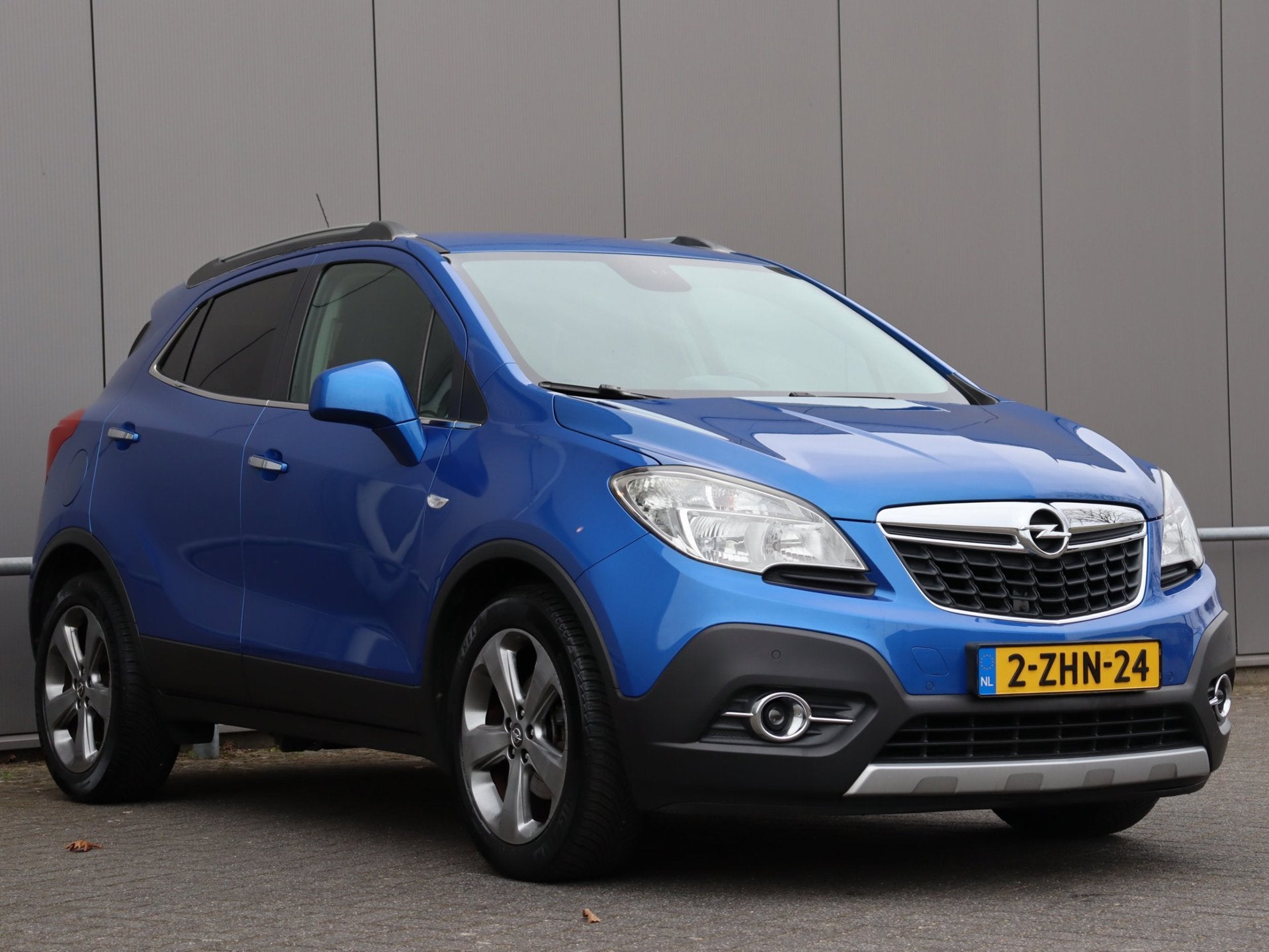 Opel Mokka 1.4 T Cosmo navi H LEER airco camera org NL, Voorwielaandrijving, Euro 5, Gebruikt, 4 cilinders