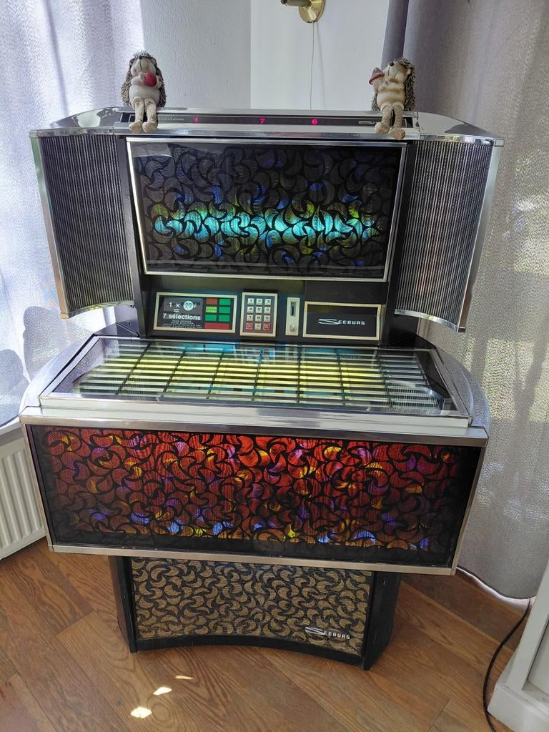 Originele Jukebox (1972/1973) met 45 toeren plaatjes, Gebruikt, 1970 tot heden, Seeburg, Ophalen