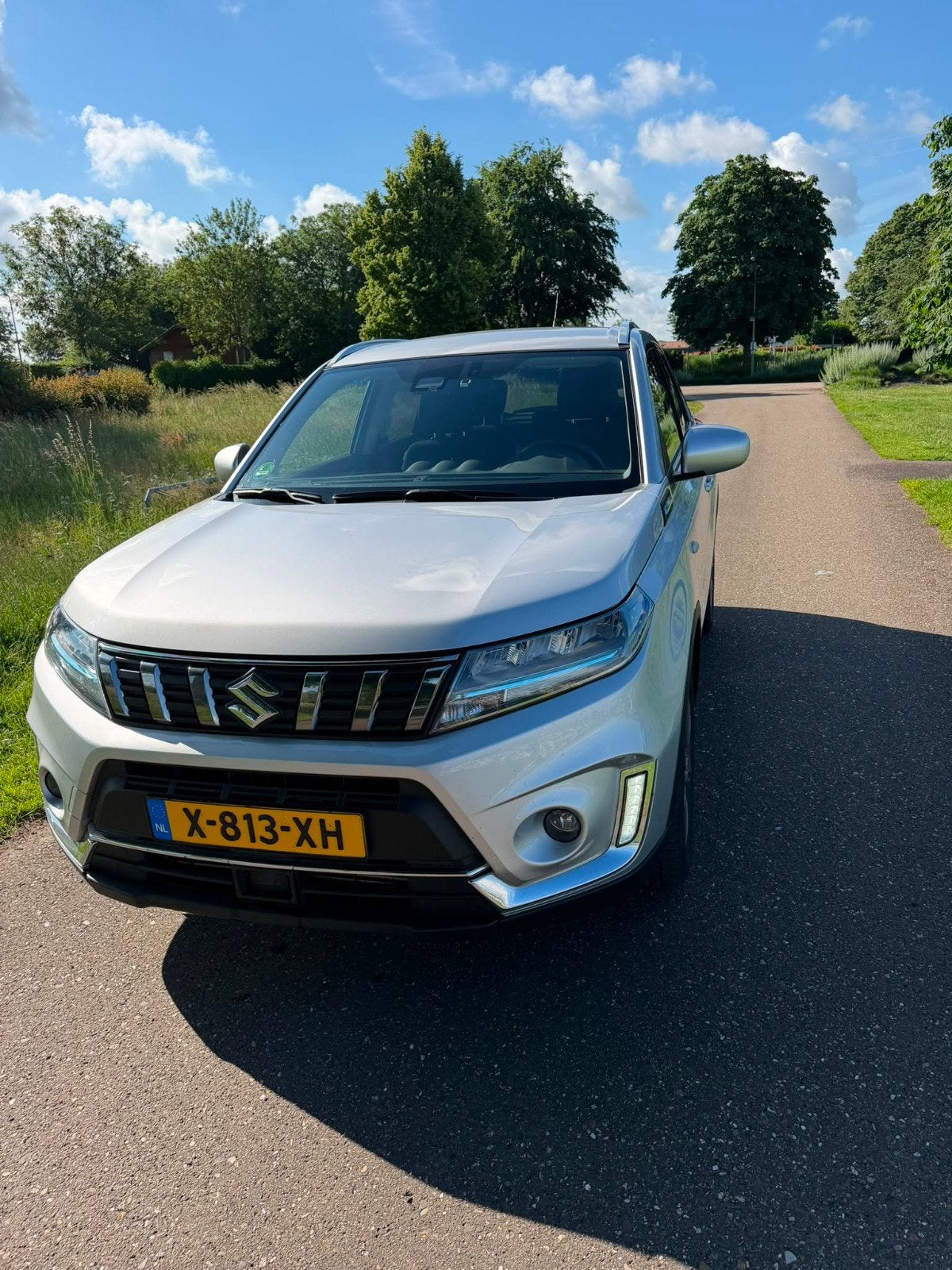 Suzuki Vitara 1.4 Boosterjet 129pk Smart Hybrid 2023 Grijs, Auto's, Suzuki, Vitara, Hybride Elektrisch/Benzine, SUV of Terreinwagen