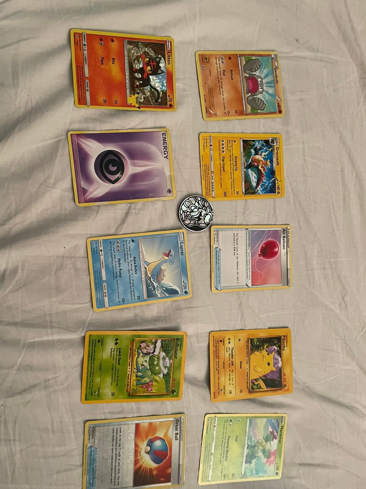 10 pokemon kaarten+ flip coin, Ophalen of Verzenden, Zo goed als nieuw