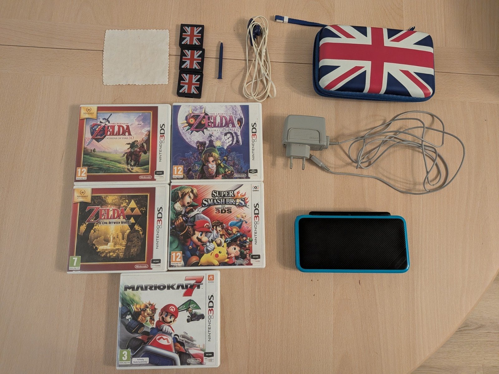 New Nintendo 2DS XL + 5 Games (Zelda, Mario Kart, Smash), Met games, Ophalen of Verzenden, Zo goed als nieuw, Zwart