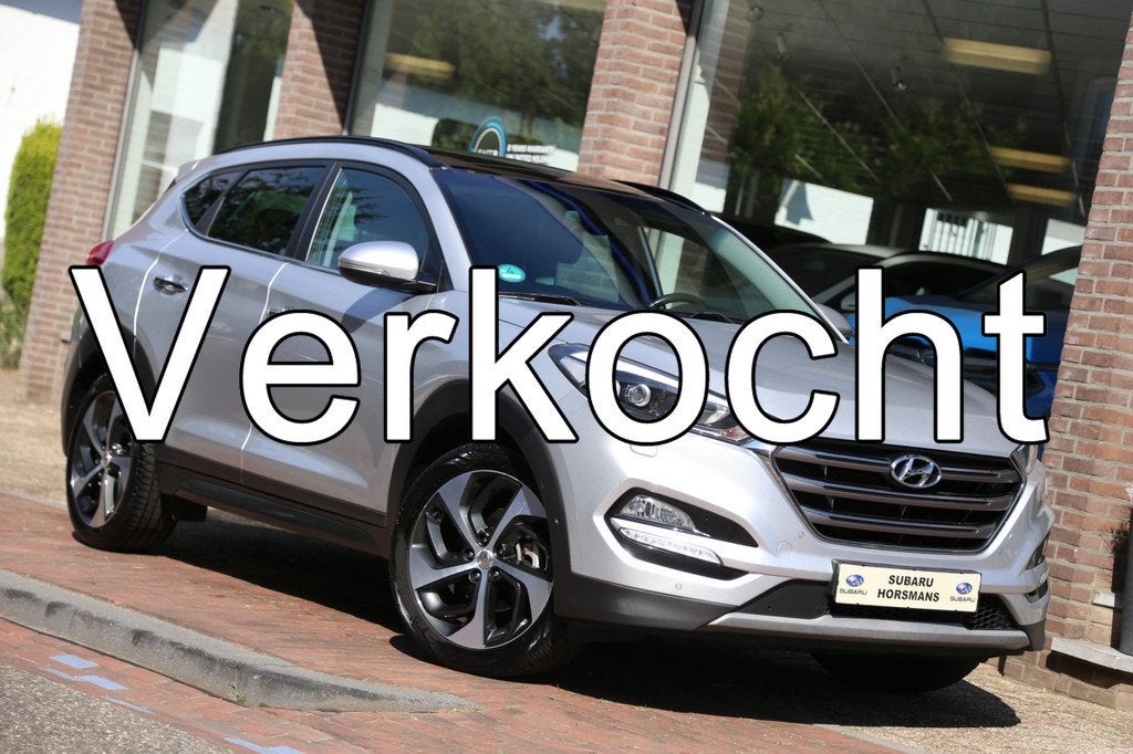 Hyundai Tucson 1.6 T-GDi Premium 4WD Schuifdak Leer Navi Cam, Auto's, Hyundai, Bedrijf, Tucson, 4x4, ABS, Achteruitrijcamera, Airbags