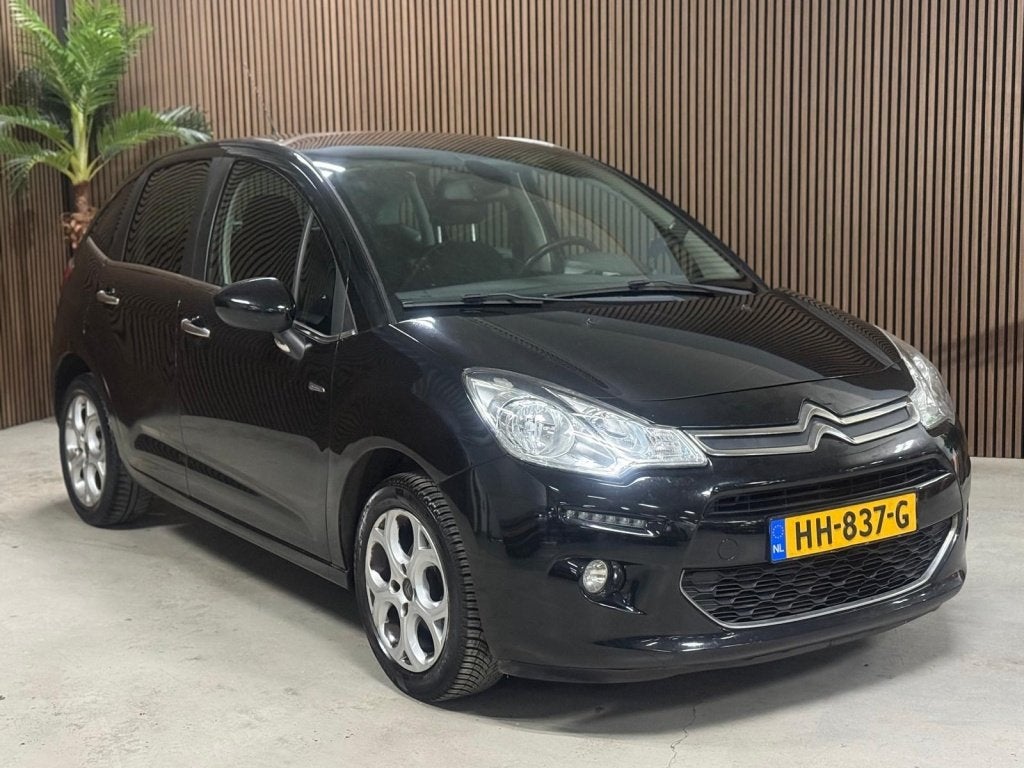 Citroën C3 1.2 PureT Exclusive (bj 2014), Auto's, Voorwielaandrijving, Stof, Gebruikt, 1199 cc