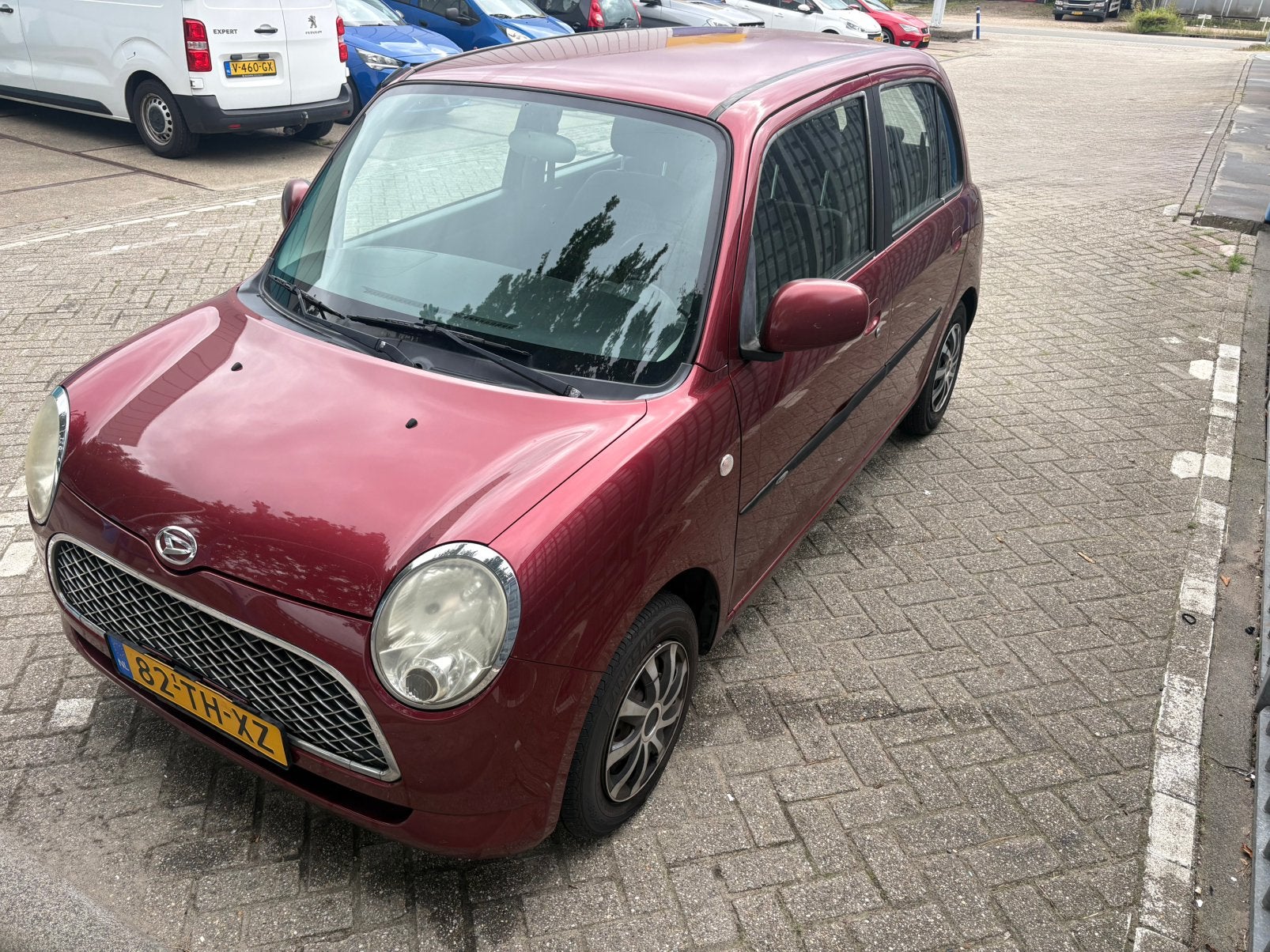 Daihatsu Trevis 1.0 2006 Rood, Auto's, Stof, 600 kg, 765 kg, Origineel Nederlands