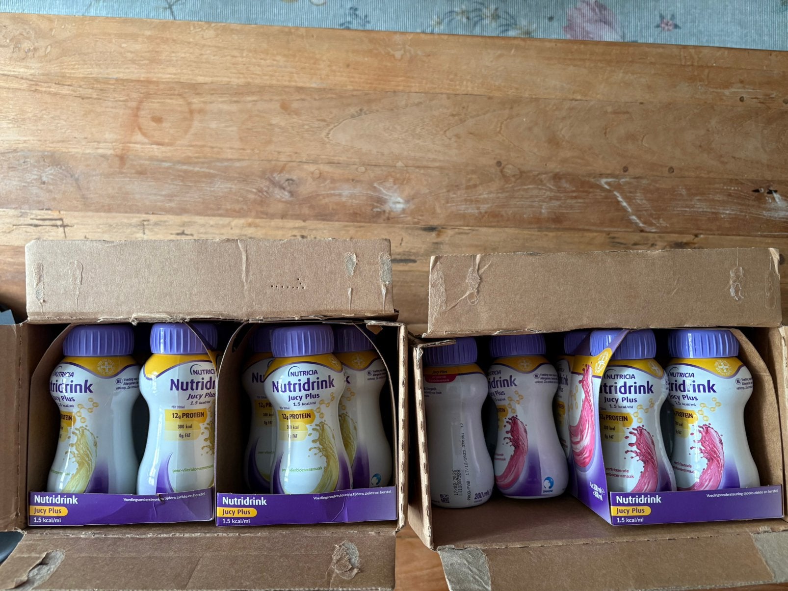 55 flesjes (200ml) nutridrank Jucy Plus (2 smaken), Ophalen of Verzenden