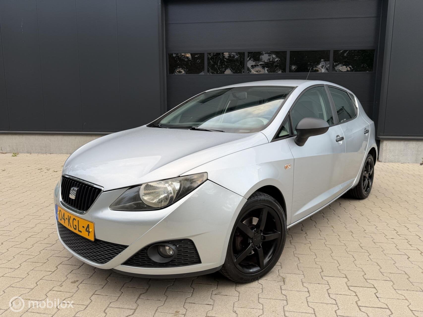 Seat Ibiza 1.2 Club Airco NAP I Weinig Km I APK I Trekhaak, Voorwielaandrijving, Euro 5, Stof, Zwart