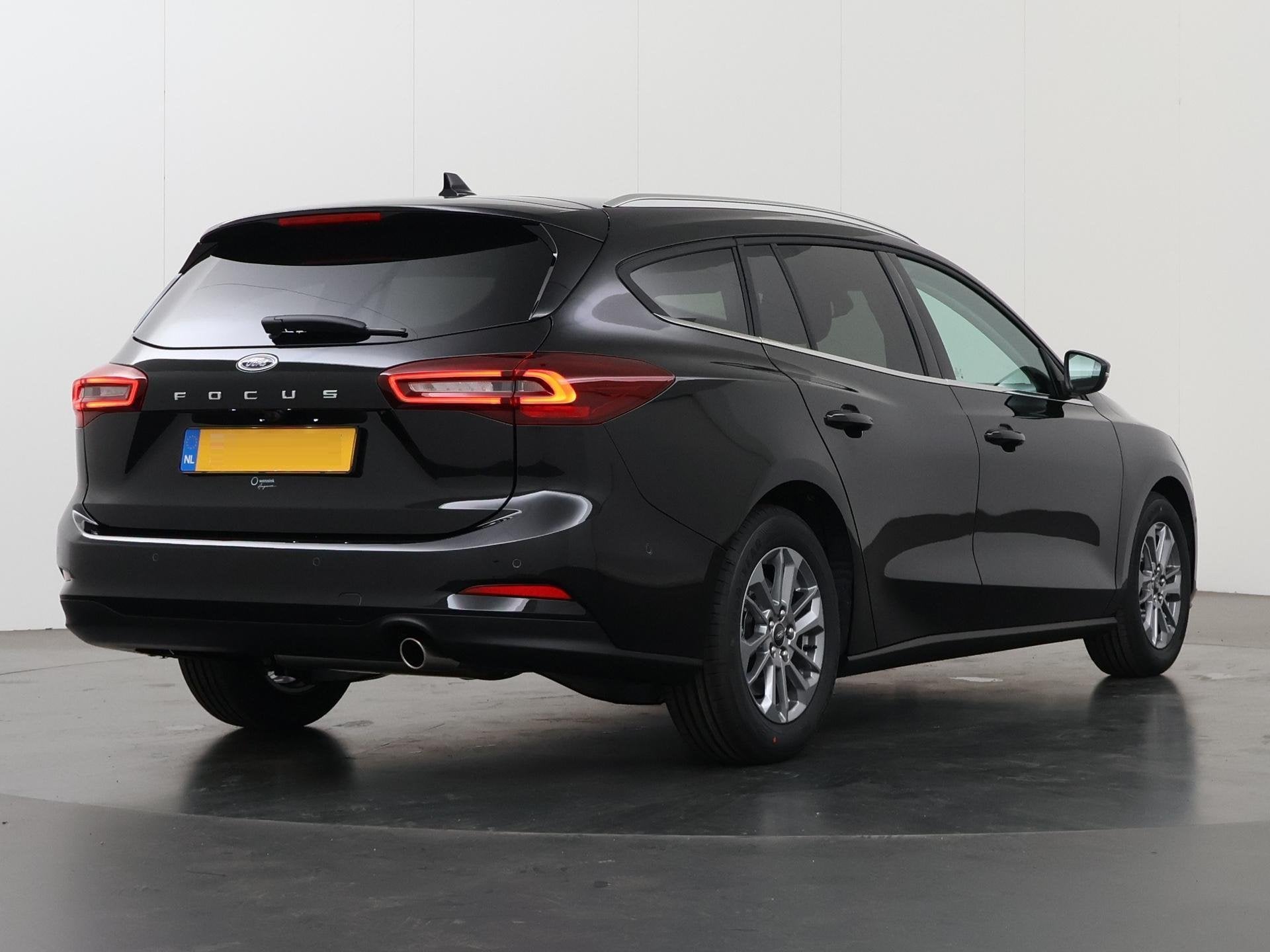 Ford Focus Wagon 1.0 EcoBoost Hybrid Titanium Winterpack, Auto's, Zwart, Origineel Nederlands, Handgeschakeld, 999 cc