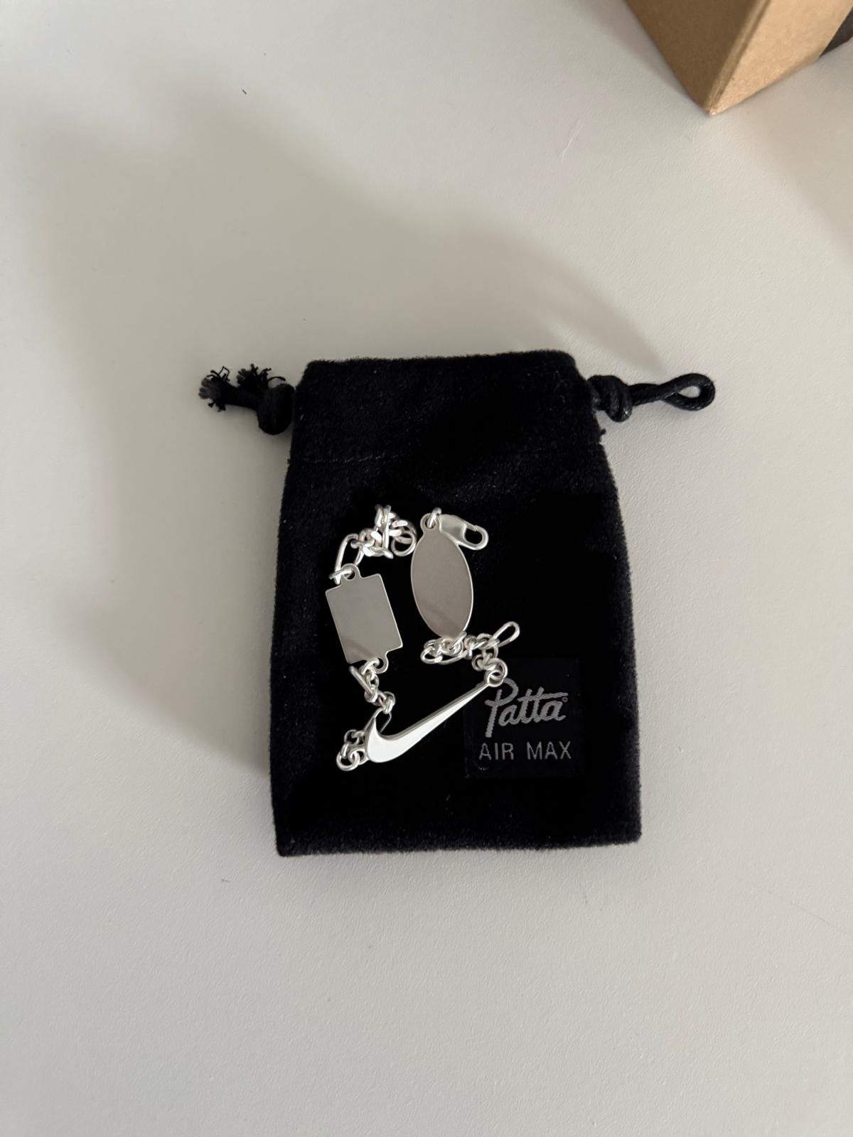 Nike x patta arband zilver kleurig orgineel!, Ophalen of Verzenden, Nieuw, Zilver, Heer of Dame