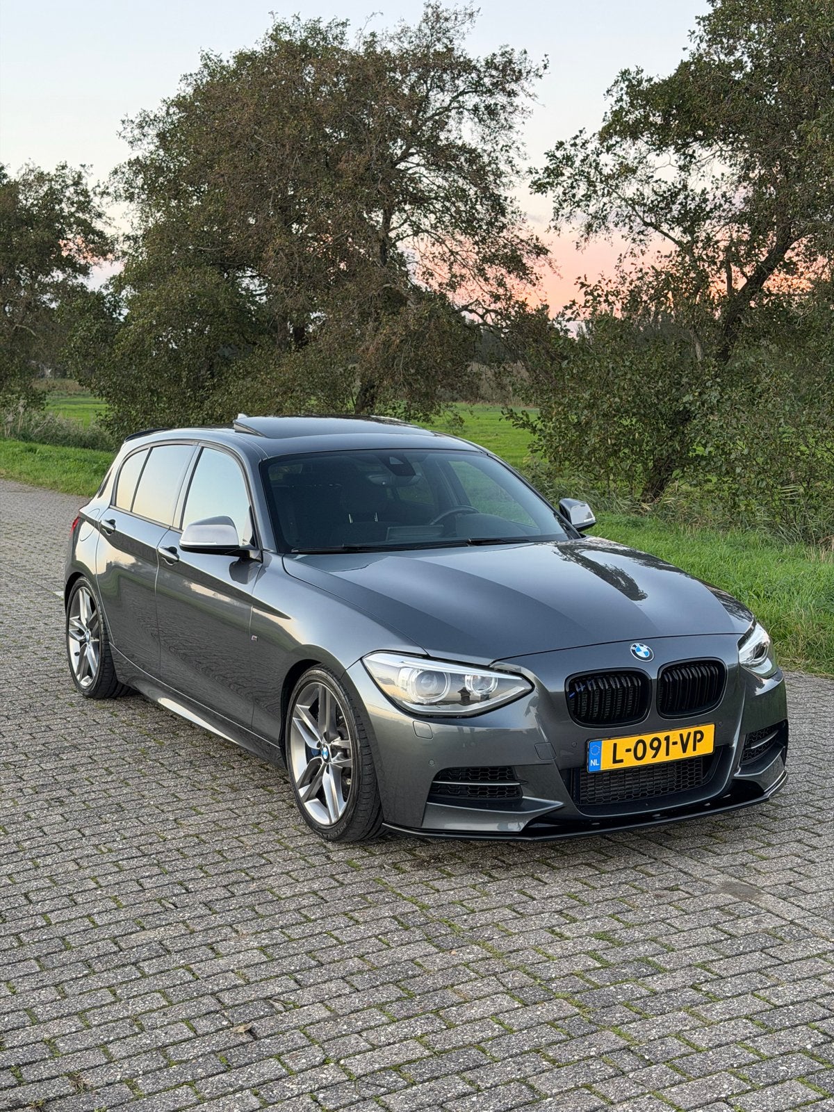 BMW M135i xDrive Automaat | KW | adaptieve xenon | Schuifdak, Auto's, 13 km/l, 320 pk, Stationwagon, Particulier