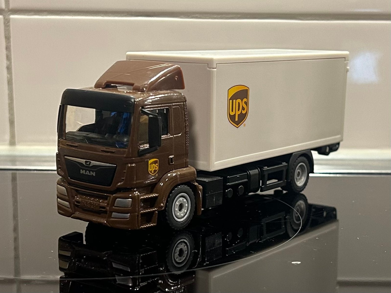Siku MAN TGS Bakwagen UPS 1:50, Verzenden, Zo goed als nieuw, Bus of Vrachtwagen, SIKU