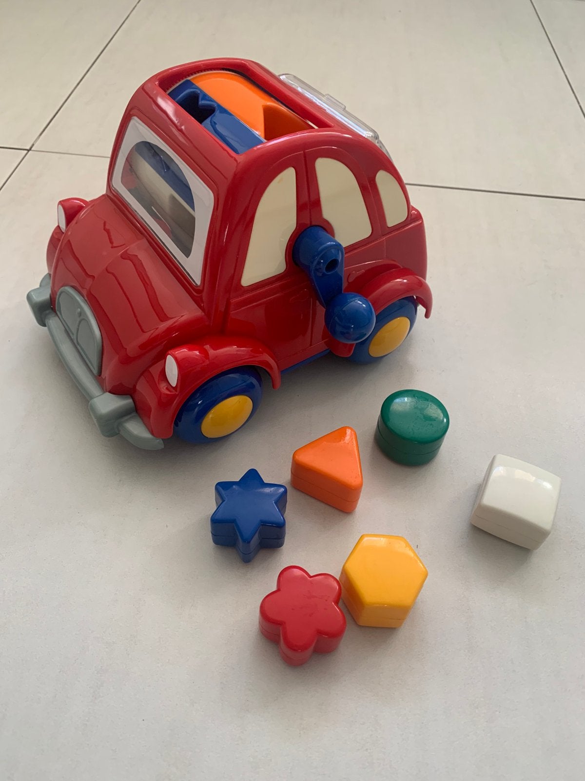 Chicco auto met blokjes, Ophalen, Zo goed als nieuw